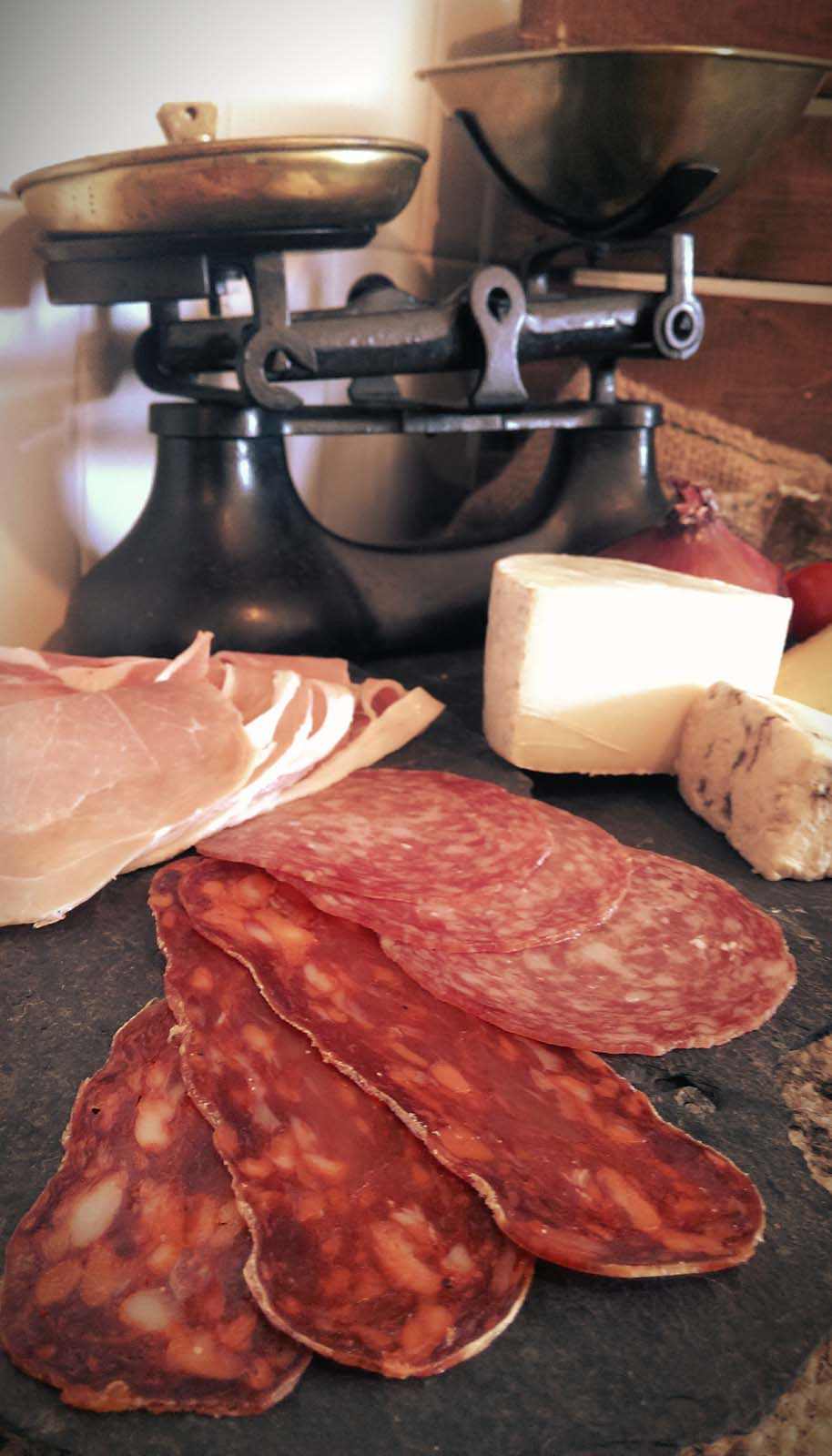 Range of Charcuterie, cured meats, salami, ham, cheese, Ullapool Scotland